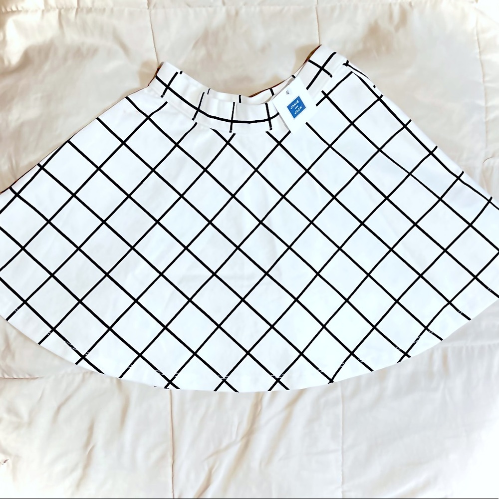 Brand new Janie and Jack black and white skirt.
